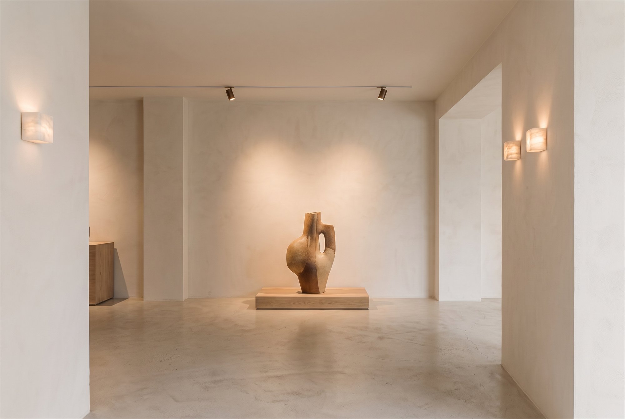PALE OBJECTS — near-monochrome gallery space with sculptural objects under controlled spot light