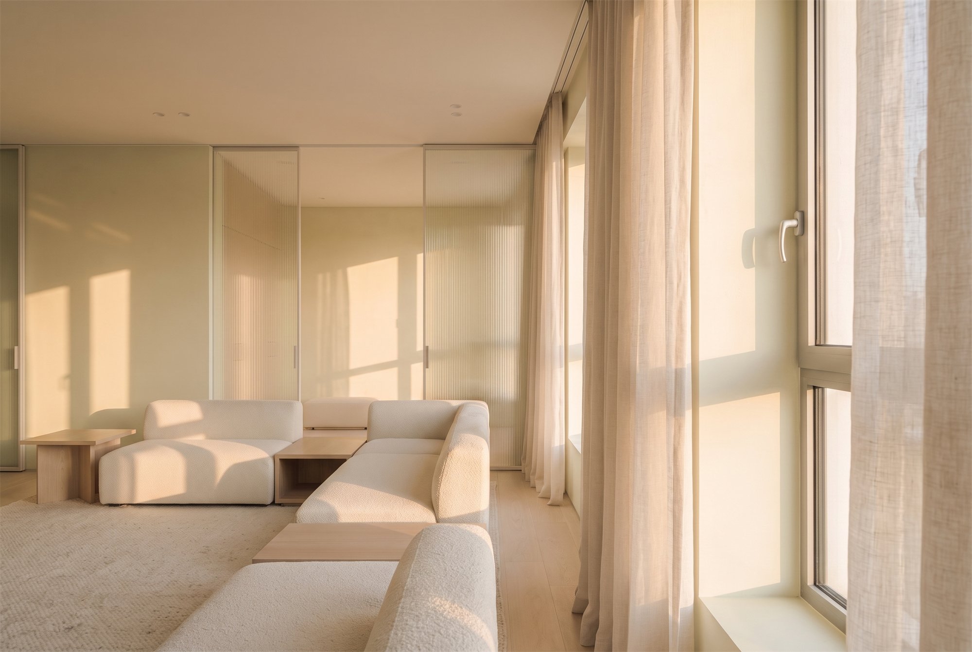 VEILED LIGHT — living space behind a sheer linen curtain and fluted glass partition